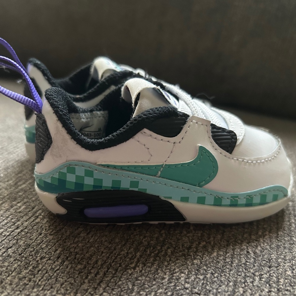 Blue, Black, white & a little purple Nike Crib Shoes